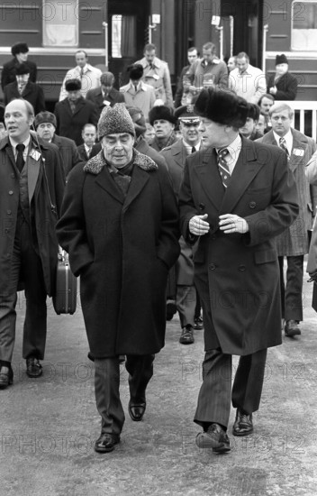 U.S. President Gerald R. Ford and Soviet General Secretary Leonid I. Brezhnev departing from train upon their arrival at Okeansky Sanatorium, Vladivostok, USSR, Gerald R. Ford White House Photographs, November 23, 1974
