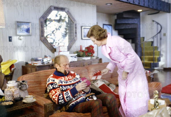 U.S. President Gerald R. Ford and U.S. First Lady Betty Ford opening presents on Christmas morning, Vail, Colorado, USA, Gerald R. Ford White House Photographs, December 25, 1975