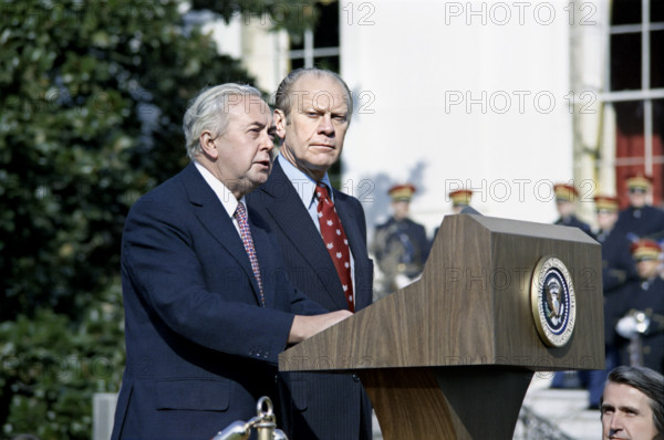U.S. President Gerald R. Ford and Prime Minister Harold Wilson of Great Britain at arrival ceremony for the Prime Minister's sate visit, White House, Washington, D.C., USA, Gerald R. Ford White House Photographs, January 30, 1975