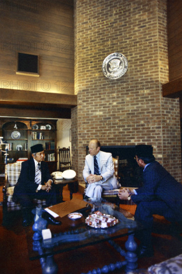 U.S. President Gerald R. Ford meeting with President Suharto of Indonesia in the living room of Laurel Lodge, Camp David, Frederick County, Maryland, USA, Gerald R. Ford White House Photographs, July 5, 1975