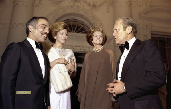 U.S. President Gerald R. Ford and U.S. First Lady Betty Ford saying goodnight to King Hussein and Queen Alia of Jordan as they depart the White House after a state dinner held in their honor, Washington, D.C., USA, Gerald R. Ford White House Photographs, March 30, 1976