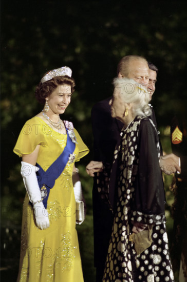 Queen Elizabeth II of Great Britain and U.S. President Gerald R. Ford greeting Alice Roosevelt Longworth, daughter of former U.S. President Theodore Roosevelt, receiving line on White House South Driveway prior to state dinner honoring Her Majesty and Prince Philip, Washington, D.C., USA, Gerald R. Ford White House Photographs, July 7, 1976
