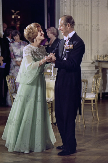 U.S. First Lady Betty Ford Dancing with Prince Philip of Great Britain in the White House State Dining Room during a State Dinner honoring Queen Elizabeth II and Prince Philip, Washington, D.C., USA, Gerald R. Ford White House Photographs, July 7, 1976