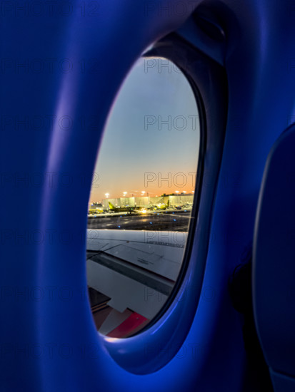 View of airport through window of Jet Blue Airlines commercial airplane, Fort Lauderdale-Hollywood International Airport, Fort Lauderdale, Florida, USA