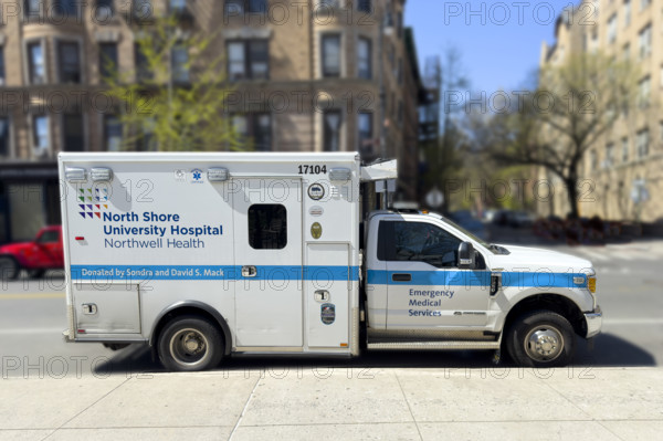 North Shore University Hospital Northwell Health EMS ambulance parked on urban street, Chelsea, Manhattan, New York City, New York, USA