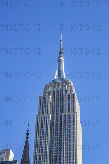 Empire State Building against blue sky, Manhattan, New York City, New York, USA