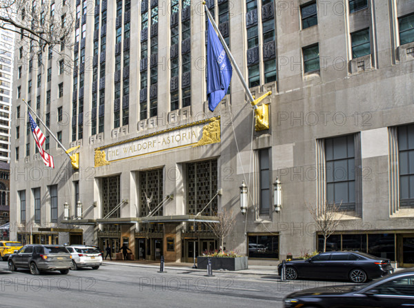 The Waldorf Astoria, luxury hotel and condominium residence, building exterior and street scene, Park Avenue, Manhattan, New York City, New York, USA