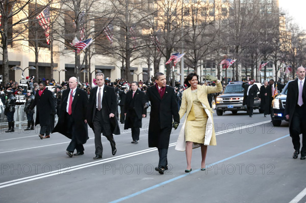 U.S. President Barack Obama and U.S. First Lady Michelle Obama walking on Pennsylvania Avenue during Inaugural Parade, Washington, D.C., USA, Pete Souza, Office of White House Photography, January 20, 2009