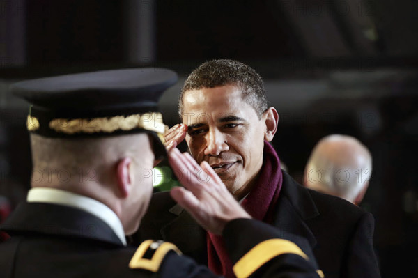 U.S. President Barack Obama saluting military officer during Inaugural Parade ceremonies, Pennsylvania Avenue, Washington, D.C., USA, Pete Souza, Office of White House Photography, January 20, 2009