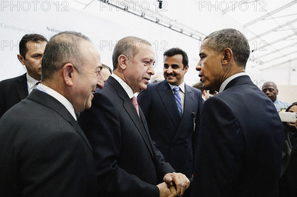 U.S. President Barack Obama talking with President Recep Tayyip Erdogan of Turkey after opening ceremony of United Nations Framework Convention on Climate Change (COP21), Parc des Expositions du Bourget, Le Bourget, Paris, France, Pete Souza, Office of White House Photography, November 30, 2015