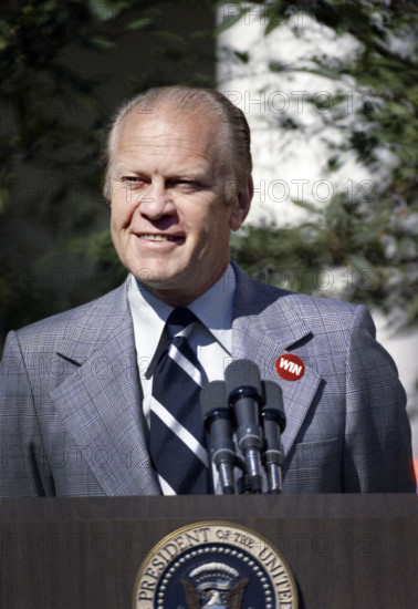 U.S. President Gerald R. Ford wearing a WIN (Whip Inflation Now) button at his second press conference,  White House Rose Garden, Washington, D.C., USA, Gerald R. Ford White House Photographs, October 9, 1974