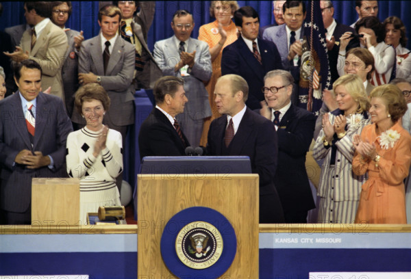 U.S. President Gerald R. Ford, as Republican presidential nominee, shaking hands with nomination foe Ronald Reagan on closing night of Republican National Convention, Kemper Arena, Kansas City, Missouri, USA, Gerald R. Ford White House Photographs, August 19, 1976