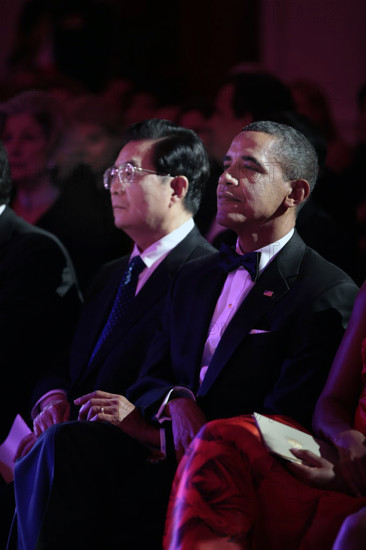 U.S. President Barack Obama and President Hu Jintao of China listen to entertainment during State Dinner in White House East Room, Washington, D.C., USA, Pete Souza, Office of White House Photography Office, January 19, 2011