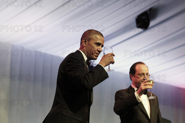 U.S. President Barack Obama and President François Hollande of France raise their glasses following President Hollande's toast during State Dinner on White House South Lawn, Washington, D.C., Pete Souza, Office of White House Photography Office, USA, February 11, 2014
