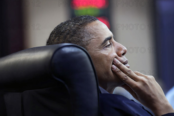 U.S. President Barack Obama participating in one in a series of meetings discussing the mission against Osama bin Laden, White House Situation Room, Washington, D.C., USA, Pete Souza, Office of White House Photography, May 1, 2011