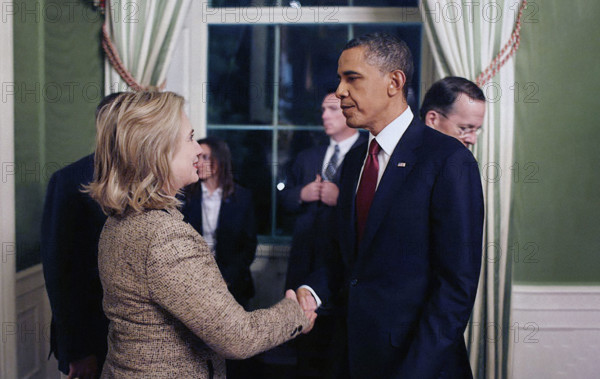 U.S. President Barack Obama shaking hands with U.S. Secretary of State Hillary Rodham Clinton in the White House Green Room following his statement detailing the mission against Osama bin Laden, Washington, D.C., USA, President Barack Obama shakes hands with Secretary of State Hillary Rodham Clinton in the Green Room of the White House following his statement detailing the mission against Osama bin Laden, May 1, 2011