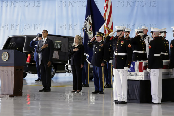 U.S. President Barack Obama and U.S. Secretary of State Hillary Rodham Clinton attending the dignified transfer Benghazi Victims, Joint Base Andrews, Maryland, USA, Pete Souza, Office of White House Photography, September 14, 2012