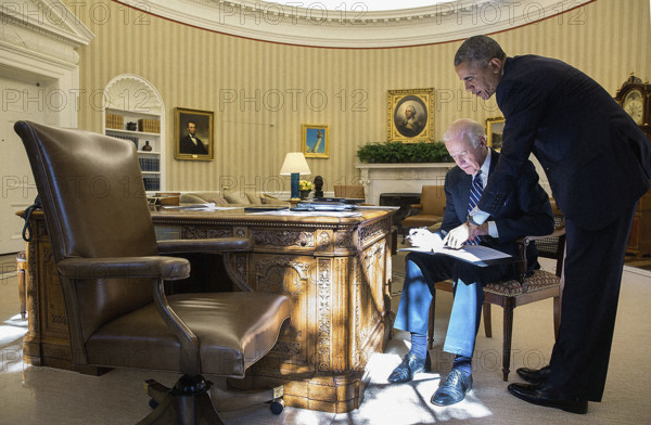 U.S. Vice President Joseph Biden reviewing his remarks with U.S. President Barack Obama before the Vice President announces that he will not be a candidate in the 2016 U.S. presidential campaign, White House Oval Office, Washington, D.C., USA, Pete Souza, Office of White House Photography, October 21, 2015