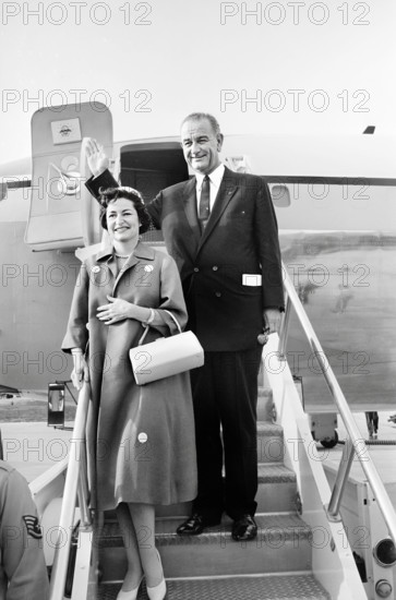 U.S. Vice President Lyndon B. Johnson and U.S. Second Lady Claudia "Lady Bird" Johnson, boarding Air Force airplane to leave for around-the-world trip, Andrews Air Force Base, Maryland, USA, Thomas J. O'Halloran, U.S. News & World Report Magazine Photograph Collection, May 9, 1961