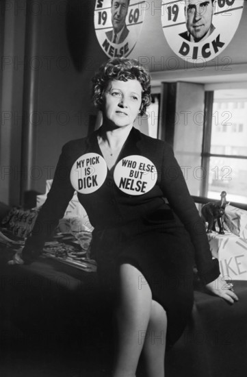 Woman seated on table, wearing Republican Party buttons supporting Richard Nixon and Nelson Rockefeller reading "My pick is Dick" and "Who else but Nelse", Warren K. Leffler, U.S. News & World Report Magazine Photograph Collection, April 15, 1959