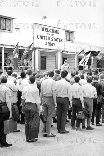 Draftees lined outside a building with a sign "Welcome to the U.S. Army", Fort Jackson, South Carolina, USA, Warren K. Leffler, U.S. News & World Report Magazine Photograph Collection, May 15, 1967