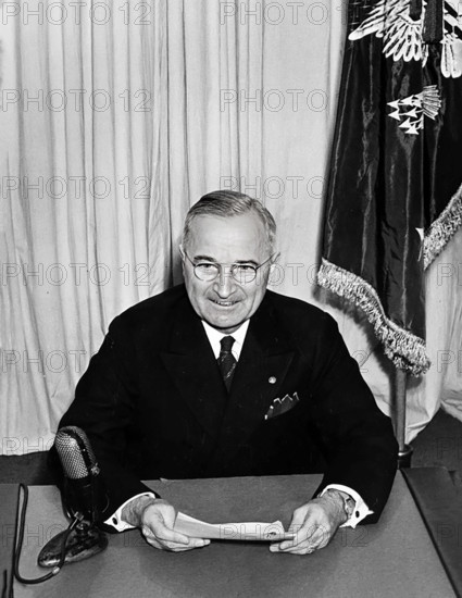 U.S. President Harry S. Truman giving radio address announcing victory in Europe over the Germans, Washington, D.C., USA, Abbie Rowe, National Parks Service, Harry S. Truman Library, May 8, 1945