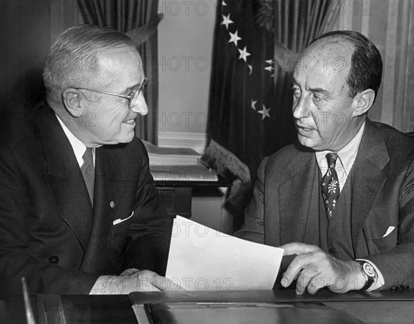 U.S. President Harry S. Truman (left) meeting with Illinois Governor and former Democratic Presidential candidate Adlai Stevenson in White House  Oval Office, Washington, D.C., USA, Abbie Rowe, National Parks Service, Harry S. Truman Library, December 4, 1952