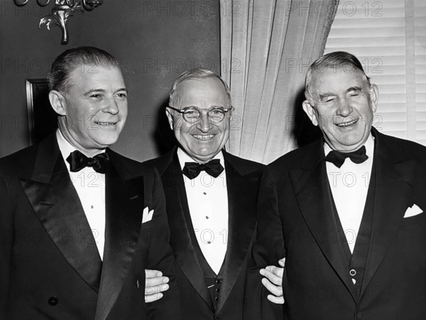 U.S. President Harry S. Truman (center), U.S. Vice President Alben Barkley (right), and unidentified man at the Truman-Barkley Dinner, Mayflower Hotel, Washington, D.C., USA, Abbie Rowe, National Parks Service, Harry S. Truman Library, January 18, 1949