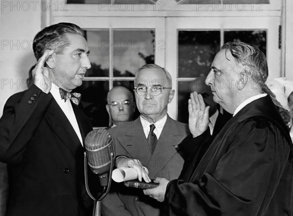 U.S. Chief Justice Fred Vinson (right) swearing in Tom C. Clark (left) as Associate Supreme Court Justice as U.S. President Harry S. Truman (center) looks on, Washington, D.C., USA, Abbie Rowe, National Parks Service, Harry S. Truman Library, August 24,1949