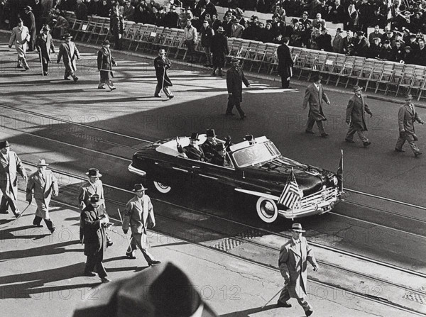 U.S. President Harry S. Truman and U.S. Vice President Alben Barkley wave to crowds their car during the Inaugural Parade, Washington, D.C., USA, Abbie Rowe, National Parks Service, Harry S. Truman Library, January 20, 1949