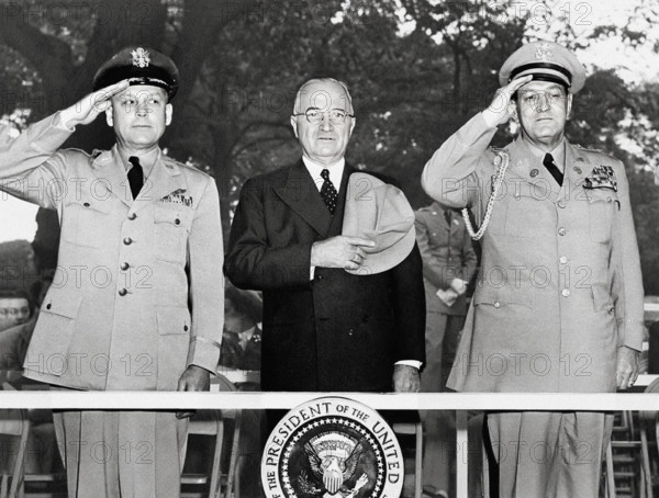 U.S. President Harry S. Truman with Brigadier General Morris J. Lee, United States Air Force, and Major General Harry Vaughan, Military Aide to the President, attending the Armed Forces Day Parade, Washington, D.C., USA, Abbie Rowe, National Parks Service, Harry S. Truman Library, May 17, 1952