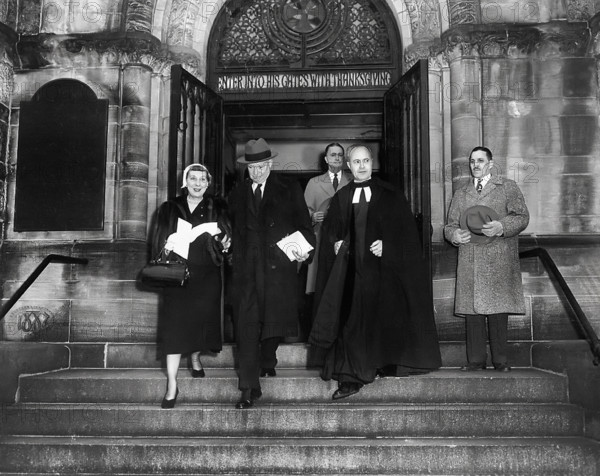 U.S. President-elect Dwight D. Eisenhower (center, wearing hat) and his wife Mamie Eisenhower (left) leaving church on morning of his Inauguration as President, Washington, D.C., USA, Abbie Rowe, U.S. National Parks Service, January 20, 1953