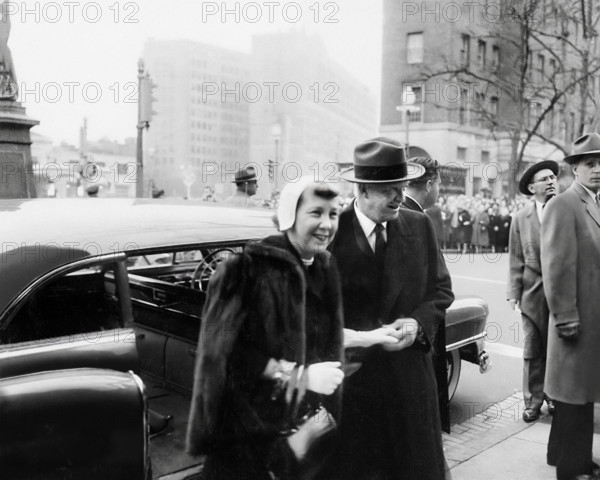 U.S. President-elect Dwight D. Eisenhower and his wife Mamie Eisenhower exiting car to attend church services on morning of his Inauguration as President, Washington, D.C., USA, Abbie Rowe, U.S. National Parks Service, January 20, 1953