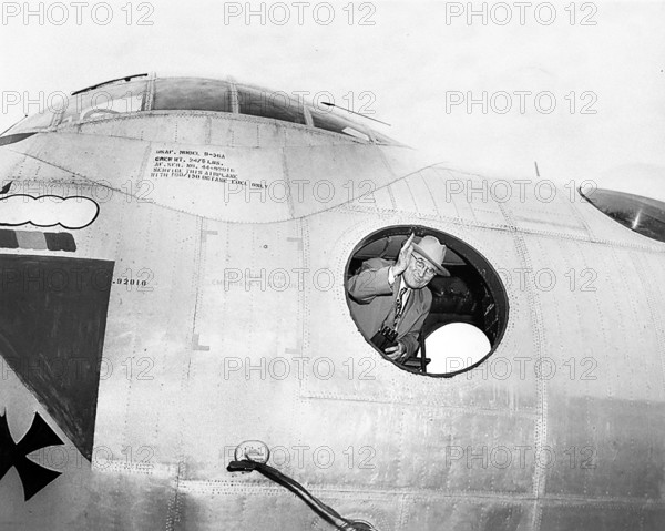 U.S. President Harry S. Truman waving from inside B-36A bomber at an air show, Andrews Air Force Base, Camp Springs, Prince George's County, Maryland, USA, Abbie Rowe, National Parks Service, Harry S. Truman Library, February 15, 1949