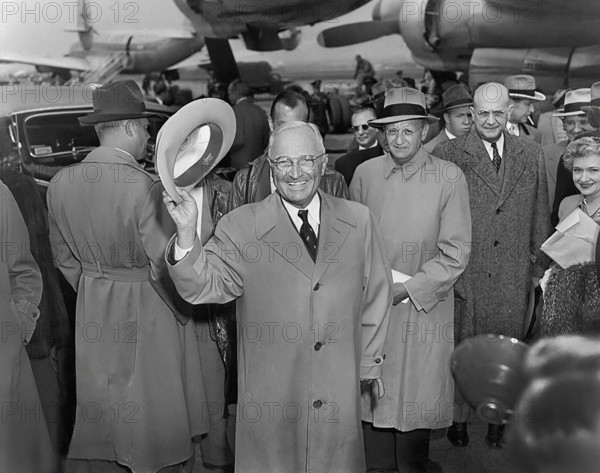 U.S. President Harry S. Truman waving upon his arrival at Washington National Airport following a vacation in Key West, Florida, Washington, D.C., USA, Abbie Rowe, National Parks Service, Harry S. Truman Library, April 10, 1950
