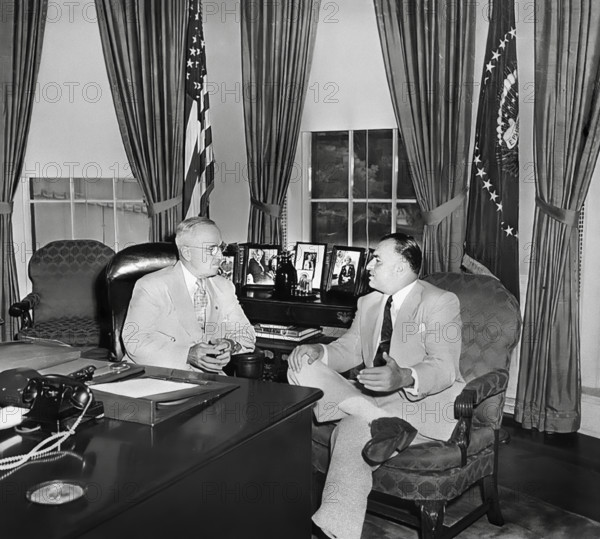 U.S. President Harry S. Truman (left) meeting with President Galo Plaza of Ecuador (right) in White House Oval Office, Washington, D.C., USA, Abbie Rowe, National Parks Service, Harry S. Truman Library, Jun2 22, 1951