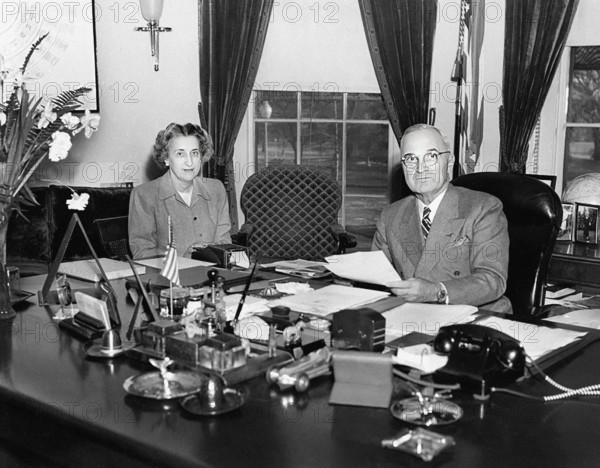 U.S. President Harry S. Truman and Rose Conway, his secretary, at the President's desk in the White House Oval Office, Washington, D.C., USA, Abbie Rowe, National Parks Service, Harry S. Truman Library, February 11, 1947