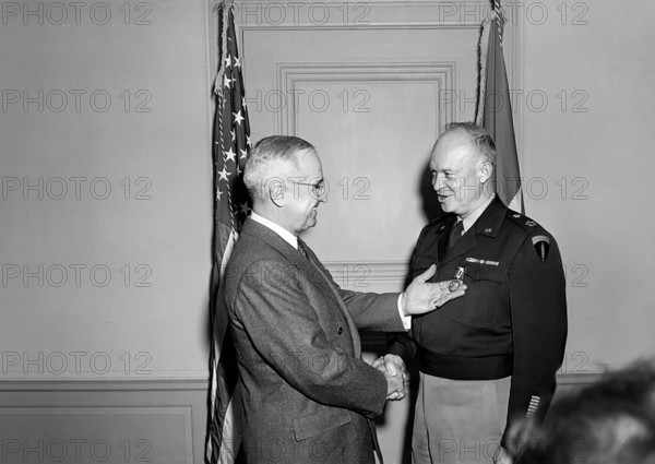 U.S. President Harry S. Truman (left) presenting U.S. General Dwight Eisenhower (right) with the third Oak Leaf Cluster to the Distinguished Service Medal, Pentagon, Arlington, Virginia, USA, Abbie Rowe, National Parks Service, Harry S. Truman Library, February 7, 1948