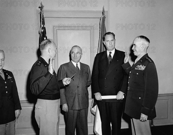 U.S. General Dwight D. Eisenhower swearing in U.S. General Omar Bradley to be Chief of Staff of the U. S. Army as U.S. President Harry S. Truman and  Secretary of the Army Kenneth Royall look on, Pentagon, Arlington, Virginia, USA, Abbie Rowe, National Parks Service, Harry S. Truman Library, February 7, 1948