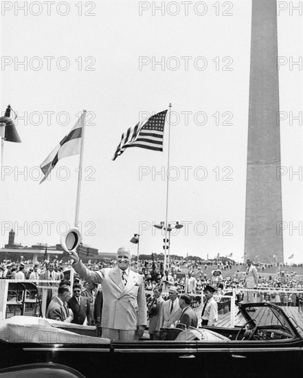 U.S. President Harry S. Truman standing in his limousine convertible as he arrived for ceremony celebrating 100th anniversary of Washington Monument, Washington, D.C., USA, Abbie Rowe, National Parks Service, Harry S. Truman Library, July 3, 1948