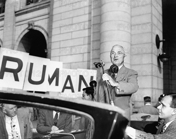 U.S. President Harry S. Truman speaking to crowd from open car upon his return from political trip during presidential campaign, Washington, D.C., USA, Abbie Rowe, National Parks Service, Harry S. Truman Library, October 2, 1948