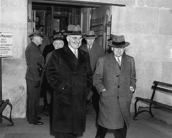 U.S. President Harry S. Truman (left) and U.S. Secretary of the Interior Harold Ickes (right), with others, at the Washington Monument, Washington, D.C., USA, Abbie Rowe, National Parks Service, Harry S. Truman Library, January 14, 1946