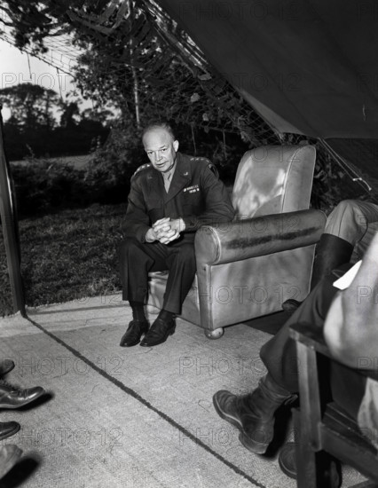 U.S. General Dwight D. Eisenhower holding press conference for war correspondents at his advance command post, where he released the fact that U.S. General George S. Patton was commanding the U.S. Third Army, Normandy, France, U.S. Army Signal Corps, August 16, 1944