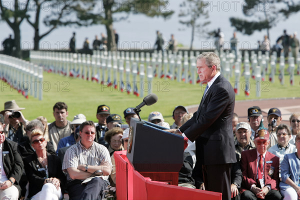 U.S. President George W. Bush addressing World War II veterans and families during 60th anniversary of D-Day at the American cemetery, Normandy, France, Paul Morse, White House Photo Office, June 6, 2004