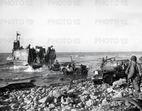 U.S. Army Jeeps of 5th Engineer Special Brigade debark from LST at Fox Green, Omaha Beach, Normandy, France, U.S. Army Signal Corps, June 12, 1944