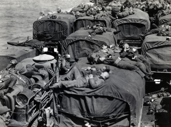 American assault troops aboard landing craft enroute from England to Cherbourg, France, U.S. Army Signal Corps, June 9, 1944