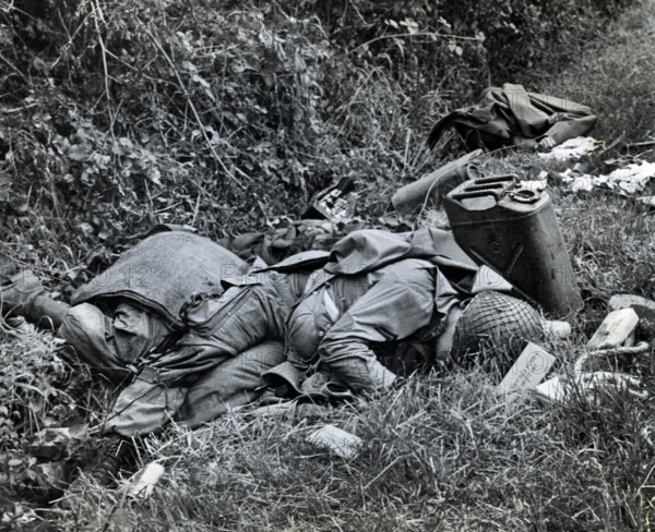 American soldiers who died in crash-landing of glider during invasion, near Utah Beach, Sainte-Marie-Du-Mont, Normandy, France, Montgomery, U.S. Army Signal Corps, June 6, 1944