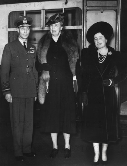 U.S. First Lady Eleanor Roosevelt being greeted by King George VI and Queen Elizabeth upon her arrival at Paddington Station, London, England, United Kingdom, Franklin D. Roosevelt Library, October 23, 1942
