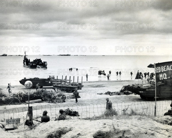Amphibious trucks bringing in supplies and returning with causalities to the ships for evacuation to England, Utah Beach, La Madeleine, Normandy, France, Kaye, U.S. Army Signal Corps, June 6, 1944