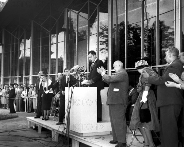 U.S. Vice President Richard Nixon making speech, Soviet Premier Nikita Khrushchev standing and applauding, while touring American National Exhibition, Sokolniki Park, Moscow, Soviet Union, Richard Nixon Foundation Collection, July 24, 1959